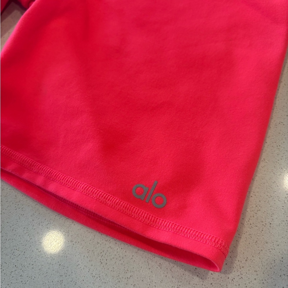 Bright pink Alo high rise biker shorts